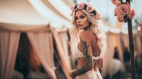 photocrafy_a_photo_of_a_blonde_female_with_flowers_in_her_hair__21ac4904-be88-4f5c-a8a5-405ec6002261-topaz-enhance-3.2x